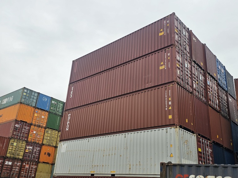 Stack of red 40 foot high cube containers